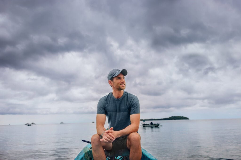 Jared Dillingham on a boat to go snorkeling around the Gili Islands