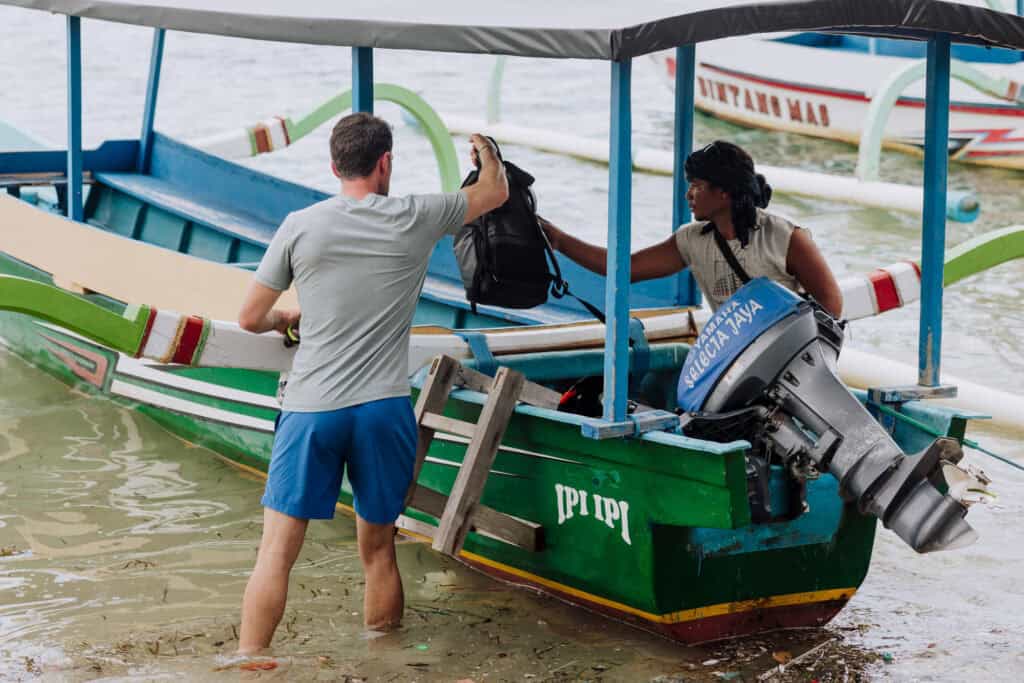 Boarding a boat to Gili Nanggu