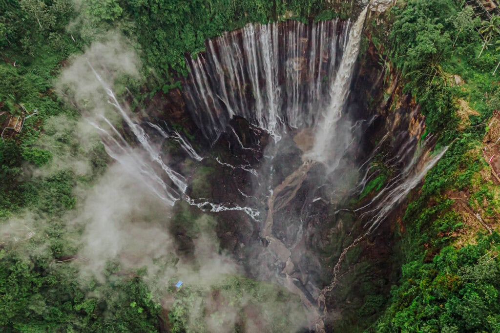 Main image of the Tumpak Sewu waterfalls in East Java, Indonesia