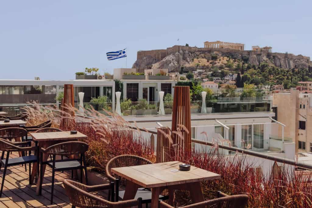 A rooftop bar in Athens, with a view of the Acropolis