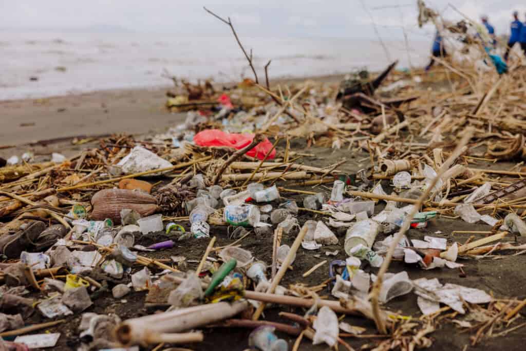 Plastic bottles and trash on a Bali beach