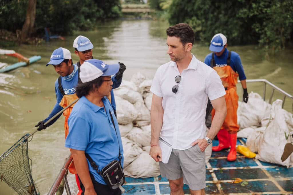 Jared Dillingham on a river cleanup with 4ocean