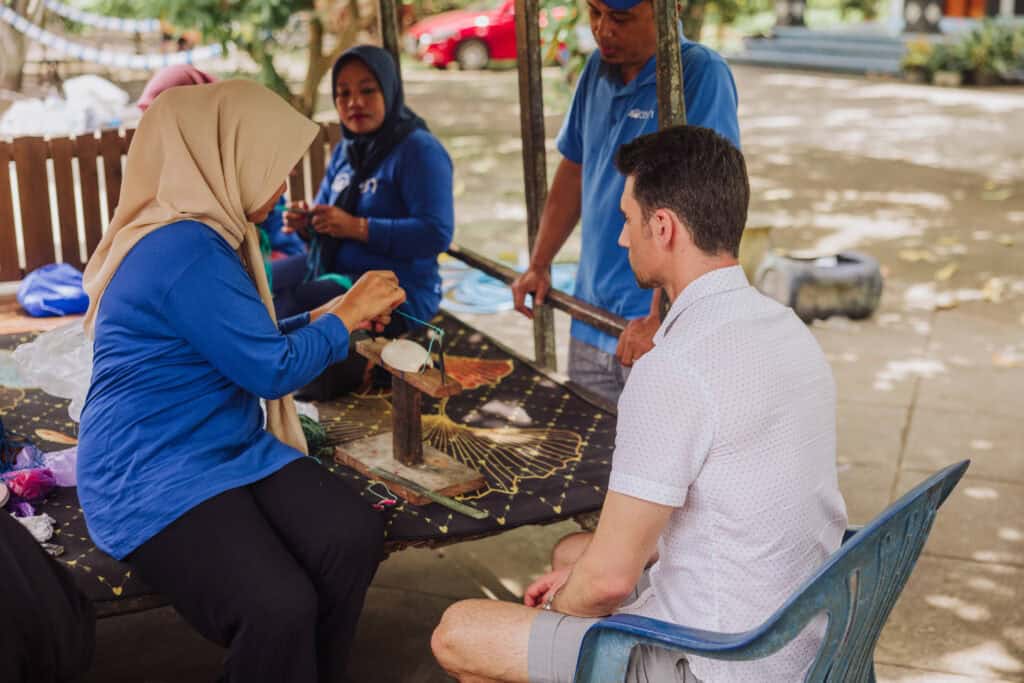 Artisans on Bali making 4ocean bracelets