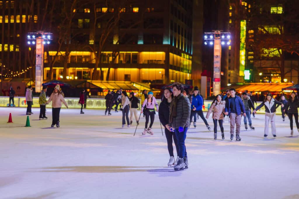 couple ice skating in Bryant Park